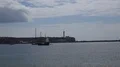 Antique two-masted caravel-type sailing ship arrive at Portimao in Portugal 4k or 4k+ Resolution