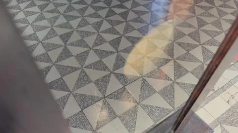 Antique wall clock with geometric pattern reflections Stock Photos