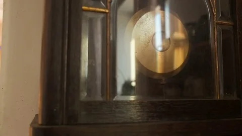Antique wall clock with a pendulum closeup, slow mothion Stock Footage 71952750