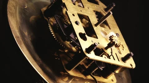 Antique Wind-up Brass clock mechanism cog and gear movement MACRO Stock Footage 313713680