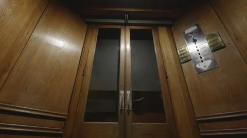 Antique wooden elevator going up. Interior shot. Stock Footage 271563226