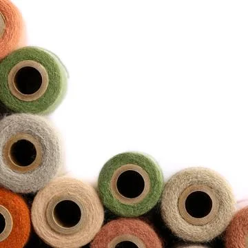 Antique yarn spool collection frame white background Stock Photos