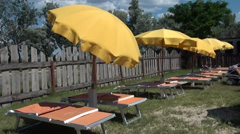 Antisun umbrellas on a beach Video stock 36521167