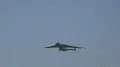 Antonov AN-225 cargo airplane overflight and shaking wings in blue sky HD Footage