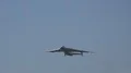 Antonov AN-225 cargo airplane overflight and shaking wings in blue sky 4k or 4k+ Resolution