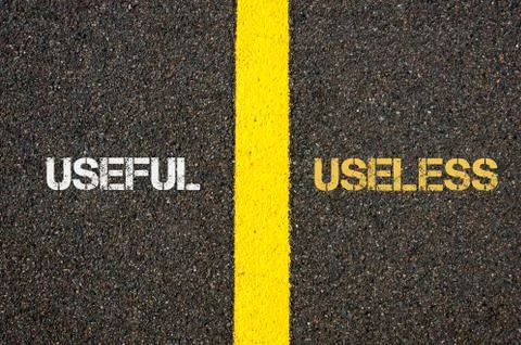 Antonym concept of USEFUL versus USELESS Stock Photos