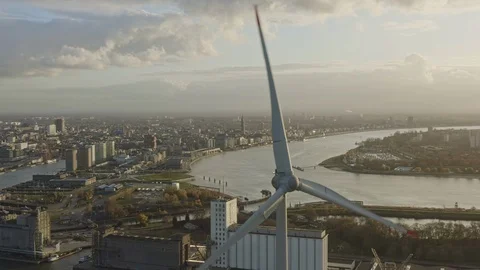 Antwerp Belgium Aerial v38 Flying around wind turbines in industrial area with Stock Footage