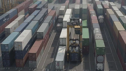 Antwerp harbour forklift transporting container Stock Footage 249183256