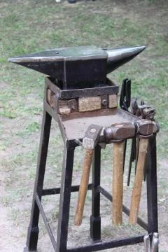 Anvil and sledgehammers Stock Photos