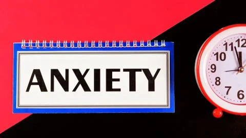 Anxiety - text message in Notepad on a creative background. Stock Photos
