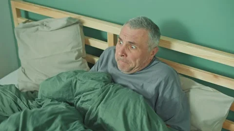 An Anxious Man Suffering from Depression and Paranoia, Feeling Panic Attacks Video stock 166707994