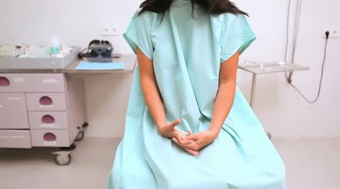 Anxious patient sitting while waiting a doctor Stock Footage 11437016