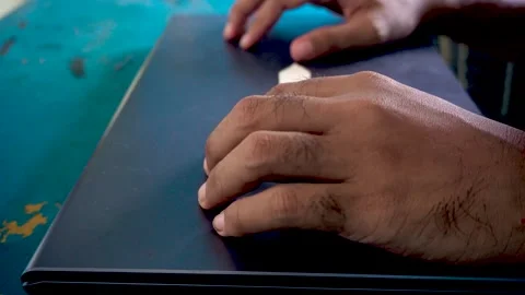 An anxious person closing a laptop computer and showing a restless movement.. Stock Footage 340489833