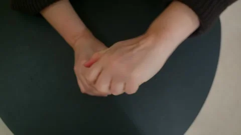 Anxious Person Wringing Hands on Table Stock-Footage 332672935