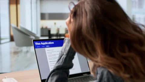 Anxious Visa Applicant Checking Real-time Status Updates Stock Footage 337226778