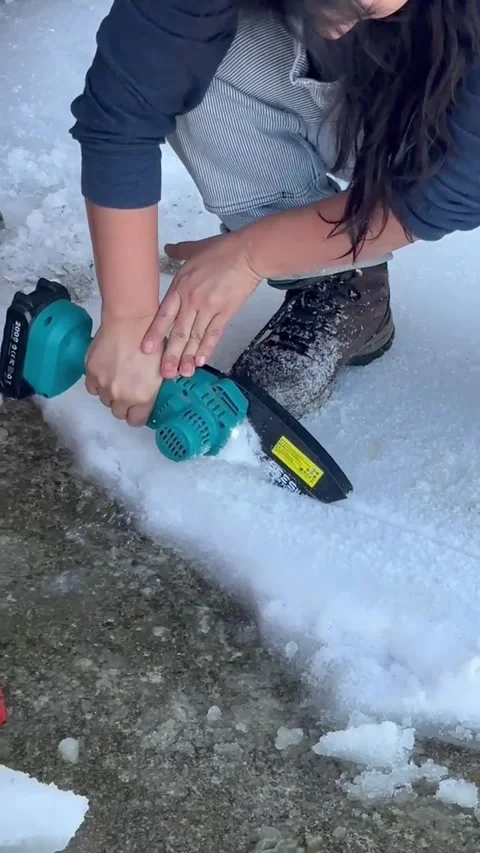 Any Excuse to Use Her Mini Chainsaw, Denton, Texas, USA - 02 Feb 2026 Video stock 328215100