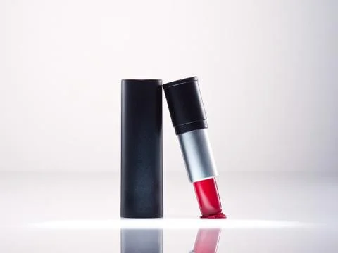 Any of various colored lipstick in a case made of black plastic and steel. Stock Photos