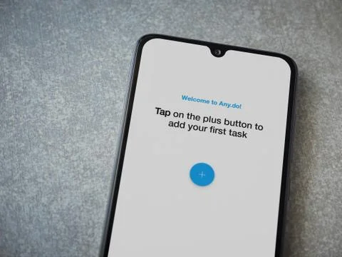 Any.Do app launch screen with logo on the display of a black mobile smartphon Stock Photos