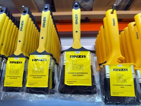 ANZA interior brushes displayed in hardware store. Stock Photos
