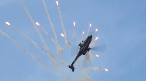 Apache AH-64 Helicopter looping with flares 11000 Stock Footage 25003060