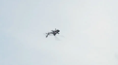Apache AH-64 Helicopter performing a roll 10954 Stock Footage 24925904