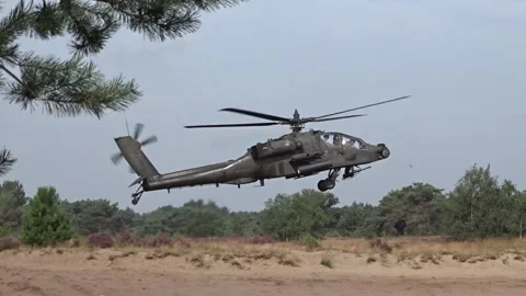 Apache Helicopter Flying Low over the ground 動画素材 159546634
