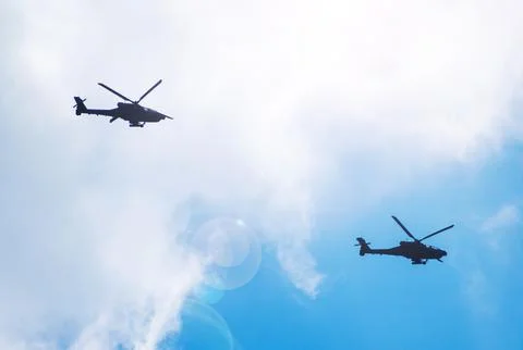 Apache helicopters in flight. Stock Photos