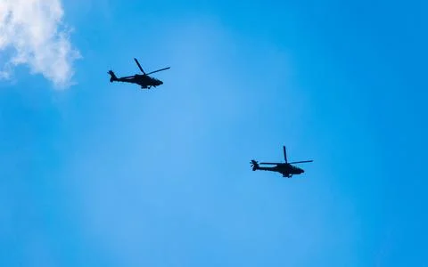 Apache helicopters in flight. Stock Photos