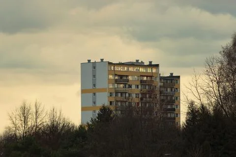 Apartment block on a background of clouds. Stock Photos