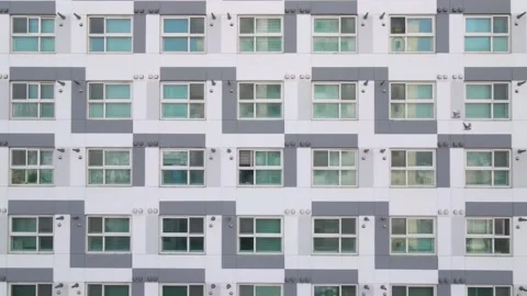 Apartment block windows close-up front view, texture and background Stock Footage 148698852
