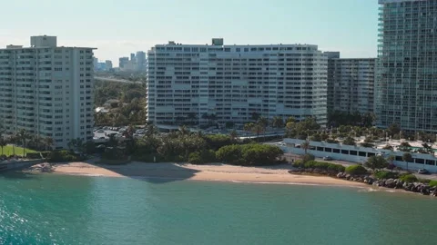 Apartment building complex. Aerial shoot along Miami seacoast Stock Footage 222409638