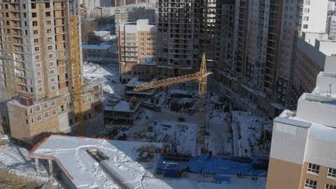 Apartment building construction site, development, new jobs creation, drone view Stock Footage 96310568