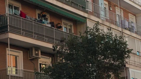 Apartment building facade with windows and balconies Stock Footage 329510042
