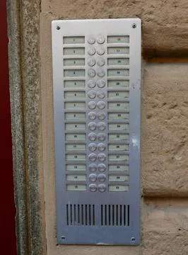 Apartment building intercom system with 30 buttons to call apartments witho.. Stock Photos