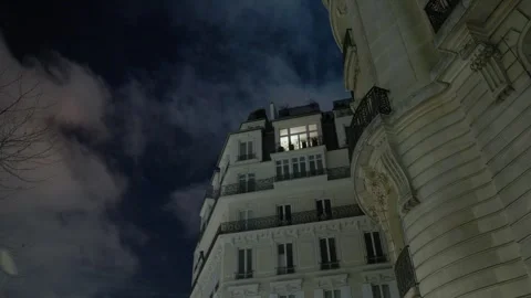 Apartment building at night with lit window, Paris, France Stock Footage 332207828