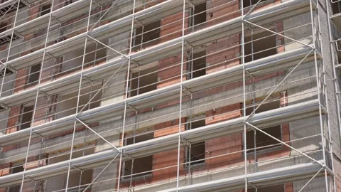 Apartment Building with Scaffolding in Early Construction Phase Stock Footage 311638024