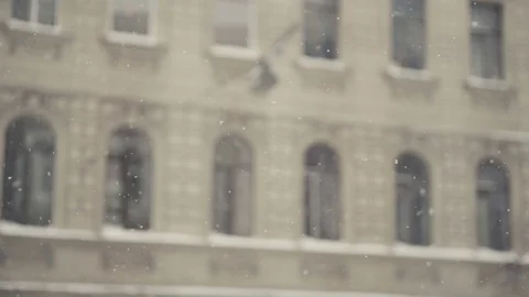Apartment Building In Snowfall slow motion Stockbeeldmateriaal 70759795
