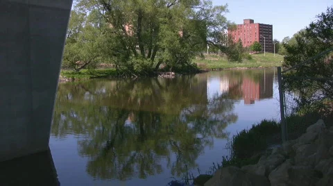 Apartment building from under a bridge Stock Footage 661269