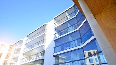 A apartment building with a unique architectural solution. Stock Photos