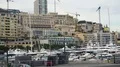 Apartment buildings and yachts docked in harbor, daytime view of Monte Carlo 4k or 4k+ Resolution