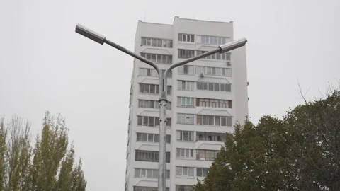 Apartment complex dominates surrounding residential area Stock Footage 306454662