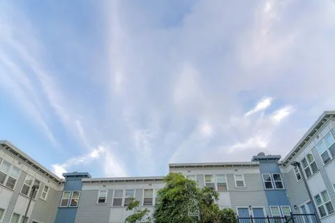 Apartment complex with u-shaped structure against the sky in San Francisco, C Stock Photos