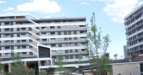 Apartment complexes with balconies and windows Stock Footage 336668786