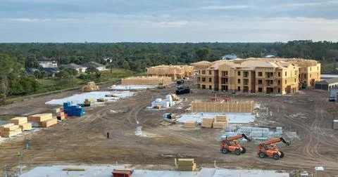 Apartment condos under construction. Development of residential housing in North Stock Photos