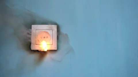 Apartment fire is caused by electrical outlet faults. Video stock 118259595
