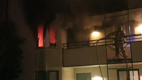 An apartment fire Stock Footage 195116890