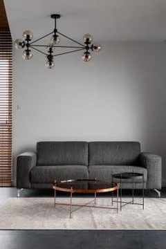 Apartment with gray sofa Stock Photos