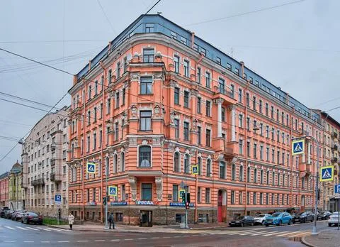 An apartment house built in 1909 at the intersection of 3rd Sovetskaya Stre.. Stock Photos