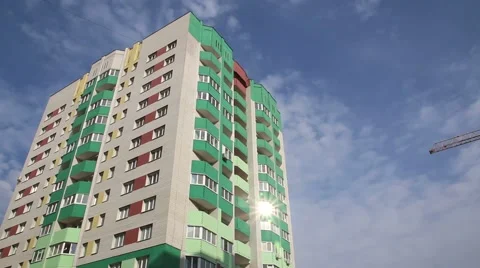 Apartment house on the sky background time lapse Stock Footage 62802260