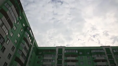 Apartment house on the sky background time lapse Stock Footage 62802266